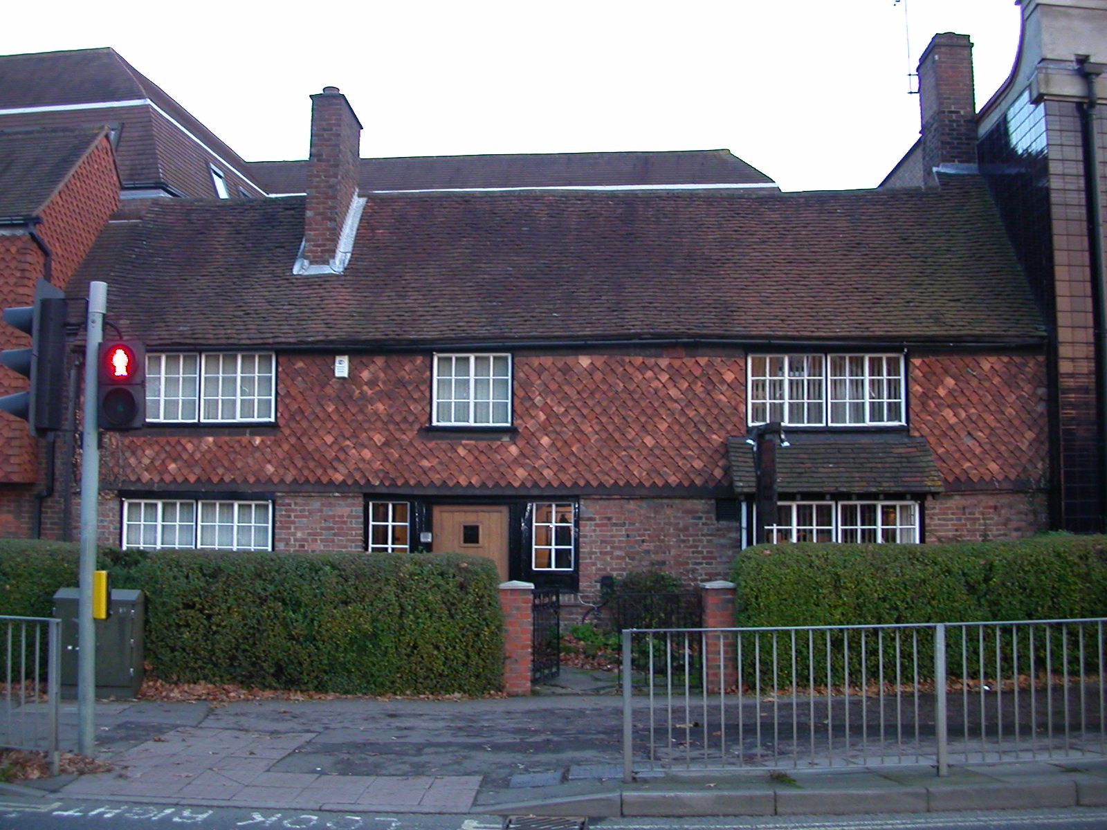 A 17th-century London street scene with timber-framed houses